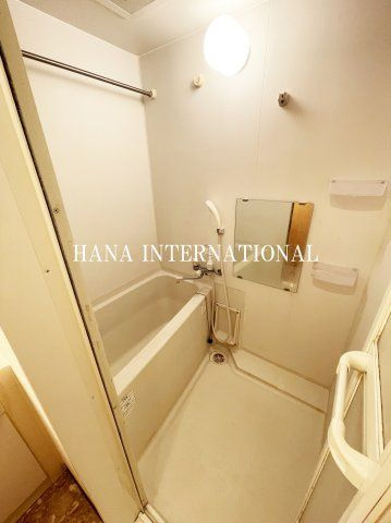 島田マインドタワーの浴室|別号室反転写真