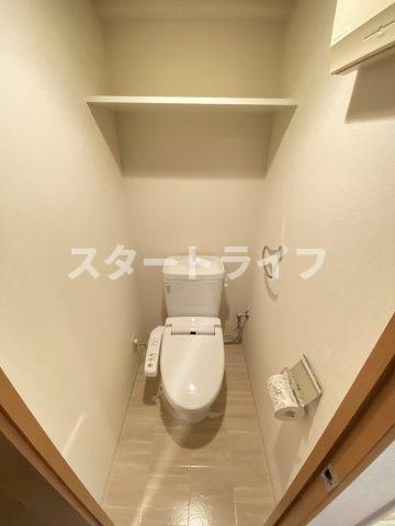 大阪市東淀川区西淡路１丁目の賃貸マンションのトイレ