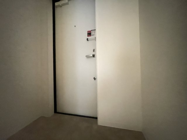 寝屋川市池田１丁目のアパートの玄関