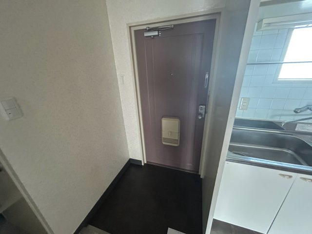 神戸市東灘区甲南町４丁目の賃貸マンションの玄関