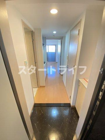 大阪市東淀川区西淡路２丁目の賃貸マンションの玄関