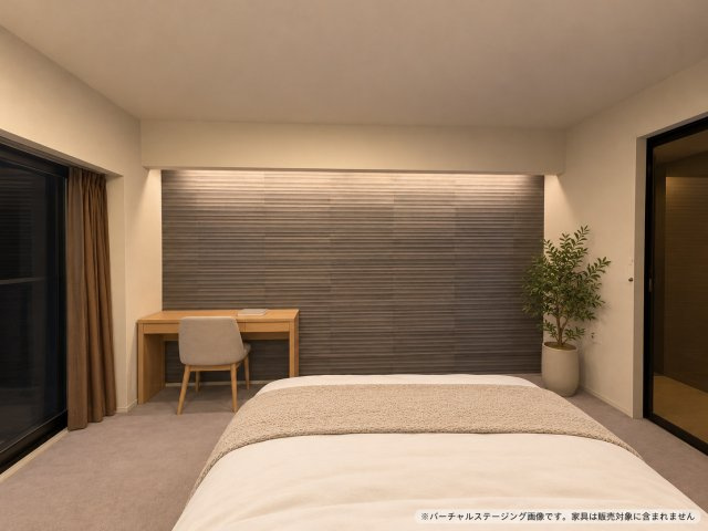 オープンレジデンシア今池の洋室|洋室（約8.3畳）
間接照明がエコカラットの壁面を美しく照らします。ワークスペースも確保できます。
※バーチャルステージング画像です。家具は販売対象に含まれません。