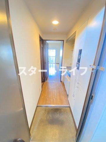 大阪市淀川区十三東３丁目の賃貸マンションの玄関