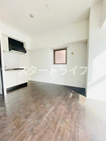 大阪市淀川区西中島７丁目の賃貸マンションの居間・リビング