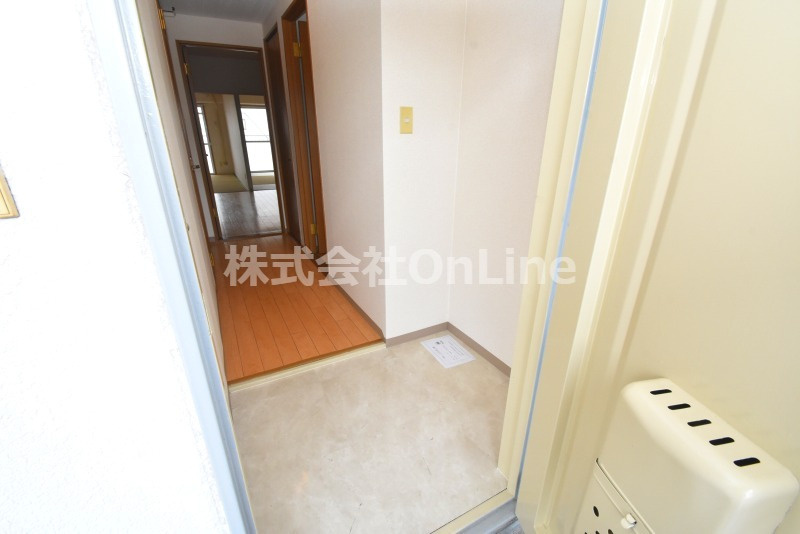 東大阪市吉田本町３丁目の賃貸マンションの玄関