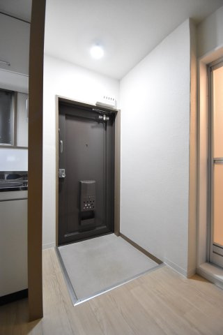 ウエキマンションの玄関