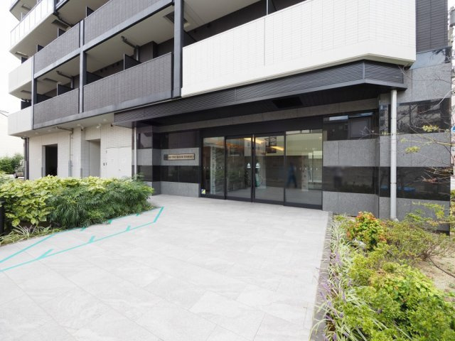 大阪市北区長柄中２丁目の賃貸マンションのエントランス
