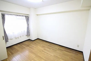 日立市十王町友部東3丁目　一棟マンションの洋室