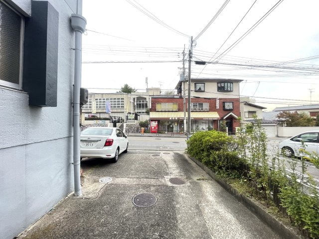 寝屋川市成田西町の賃貸マンションのエントランス