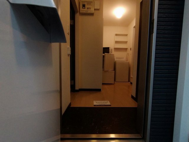 レオネクストＰＩＭＡの玄関
