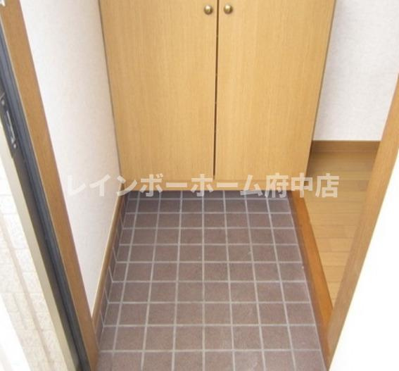 コーポいなのべ２号棟の玄関
