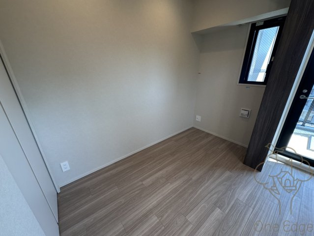 シーズンフラッツ南森町PREMIERの寝室
