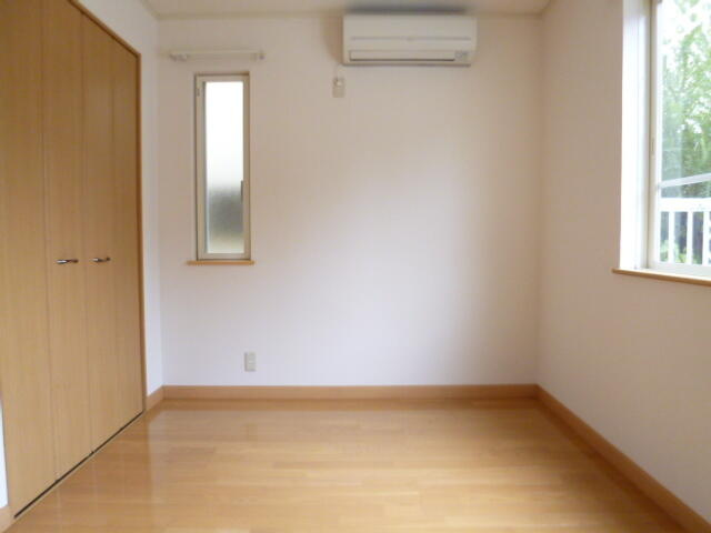 調布市八雲台１丁目のアパートの寝室