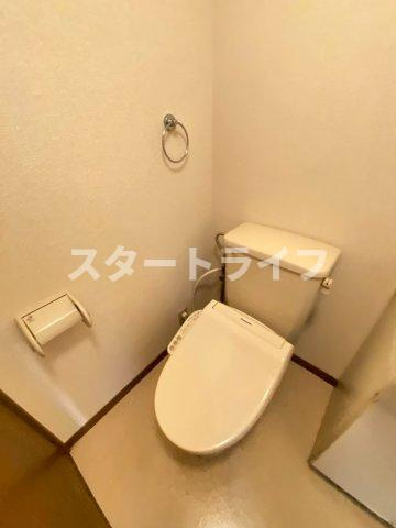 大阪市淀川区十三東１丁目の賃貸マンションのトイレ
