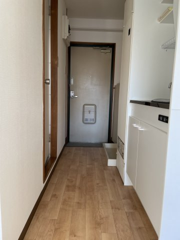 稲城市矢野口の賃貸マンションの玄関