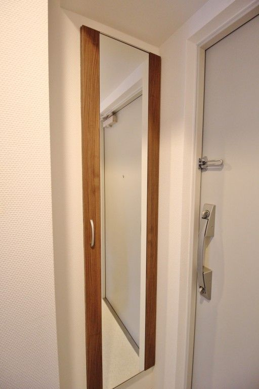 イート アパートメント ヴェリタスの玄関