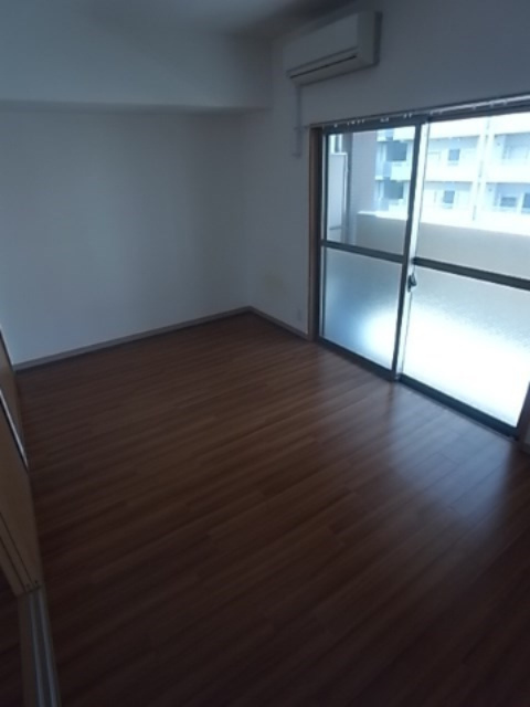 Sunny Court Meiwaの寝室