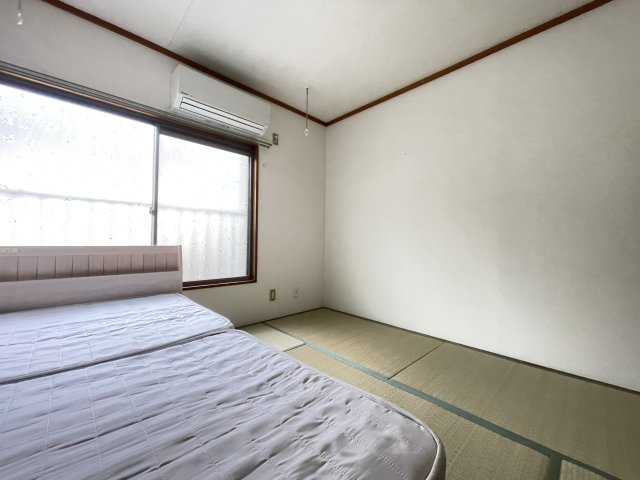 寝屋川市境橋町のアパートの寝室