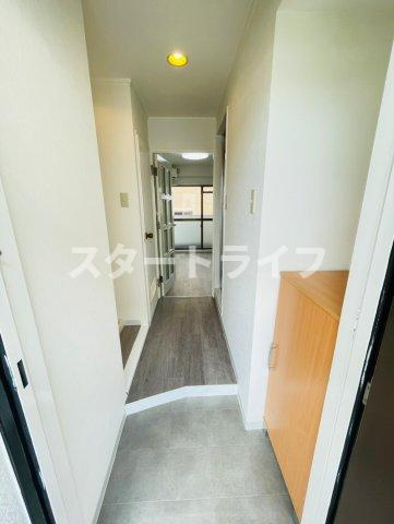 大阪市淀川区木川西１丁目の賃貸マンションの玄関