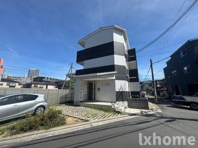 ラルーチェ千里丘の外観