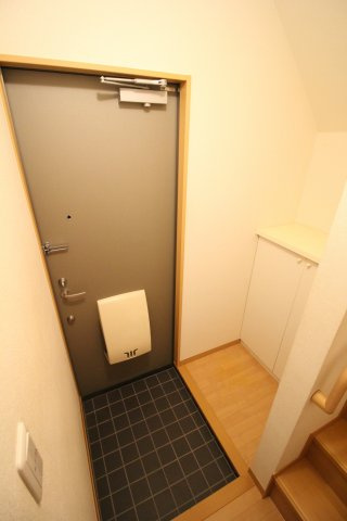 コンフォールタカハの玄関