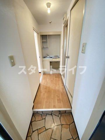 大阪市東淀川区西淡路１丁目の賃貸マンションの玄関