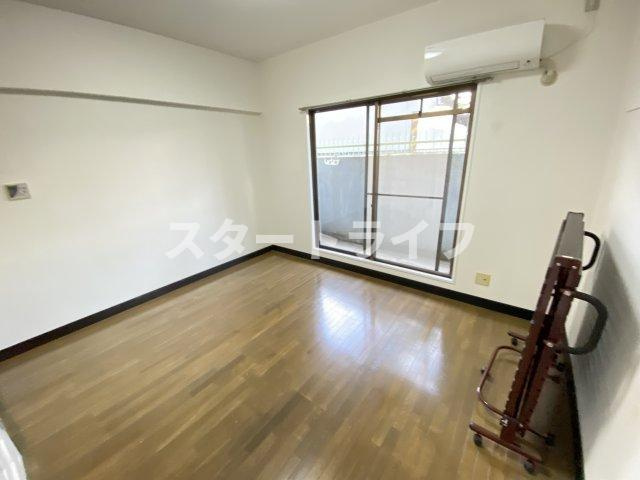 大阪市淀川区木川東３丁目の賃貸マンションの居間・リビング