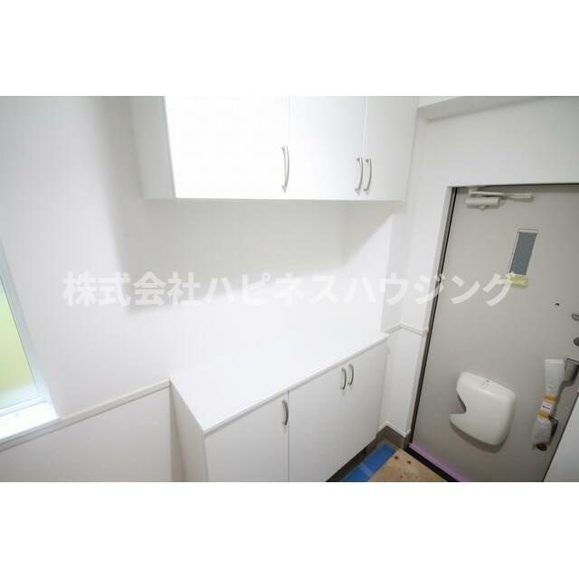 流山市駒木借家Ａ棟(ナガレヤマシコマギシャクヤエートウ)の玄関