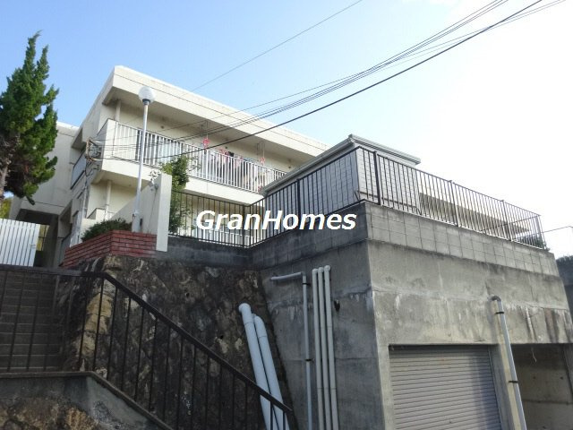 西新在家マンションの外観