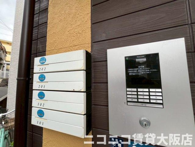 池田市石橋４丁目のアパートのエントランス
