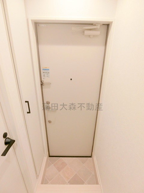 ソルナクレイシア蒲田の玄関