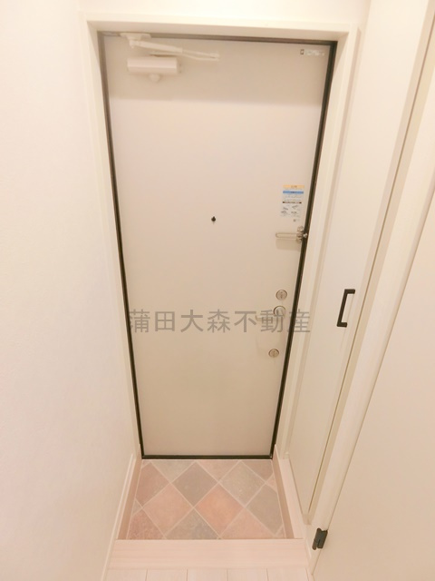 ソルナクレイシア蒲田の玄関