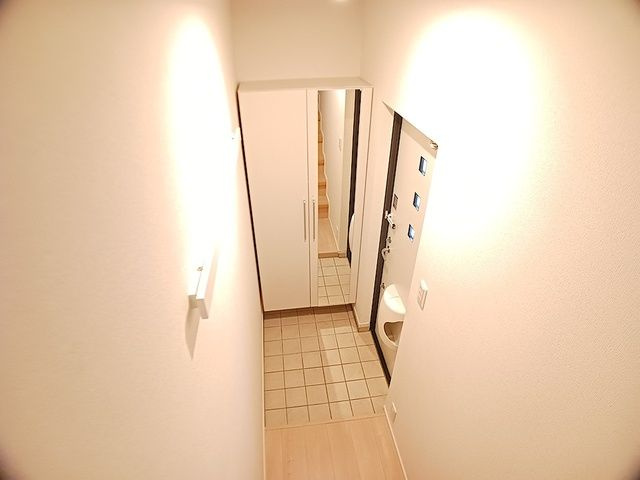 プチメゾン松和花壇の玄関