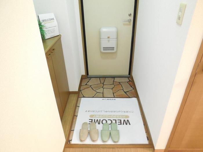 日の出第一秋新ハイツの玄関
