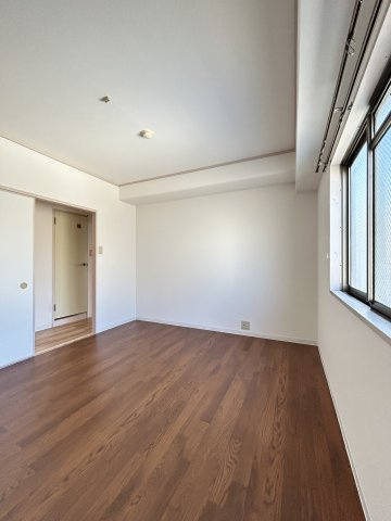 大阪市浪速区桜川２丁目の賃貸マンションの寝室