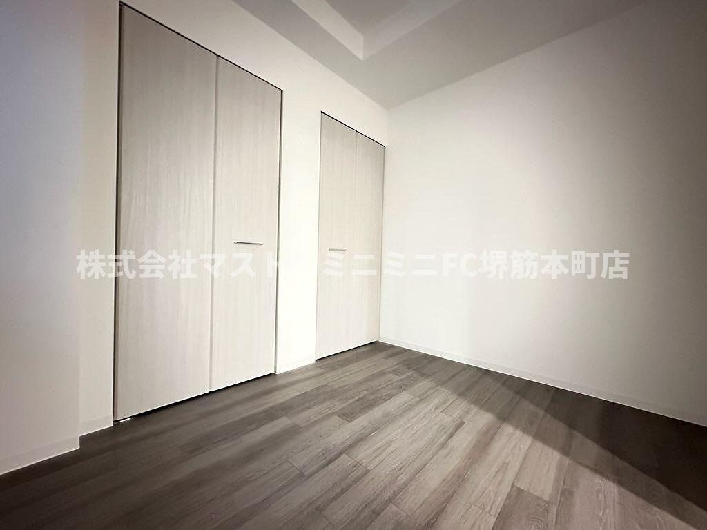 プレサンス堺筋本町エグゼブランの洋室