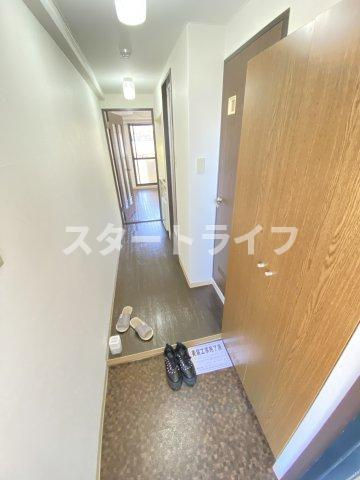 大阪市東淀川区上新庄１丁目の賃貸マンションの玄関