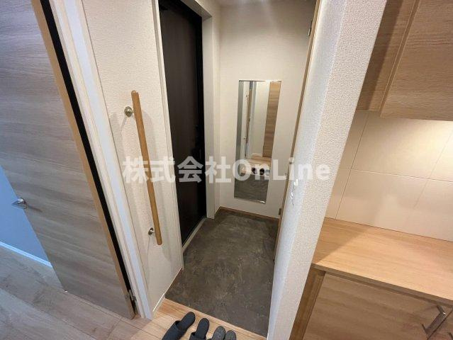 八尾市渋川町４丁目のアパートの玄関