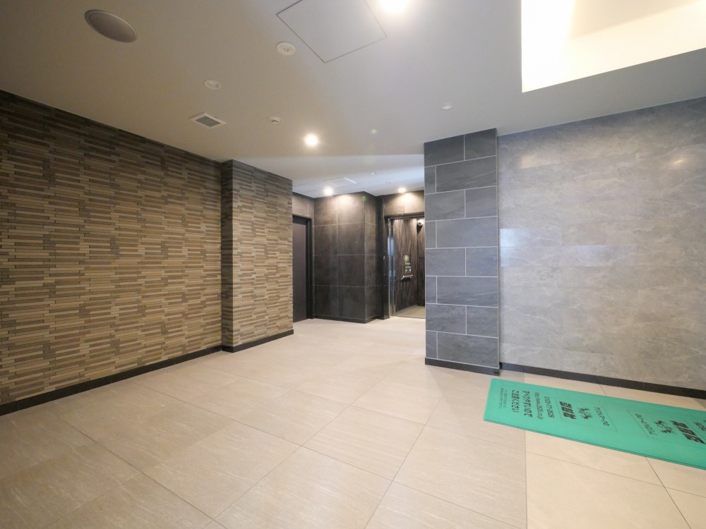 大阪市西淀川区花川２丁目の賃貸マンションのロビー