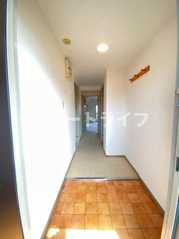 大阪市淀川区十三本町３丁目の賃貸マンションの玄関