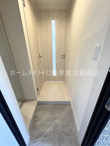 大阪市城東区鴫野東３丁目のアパートの玄関
