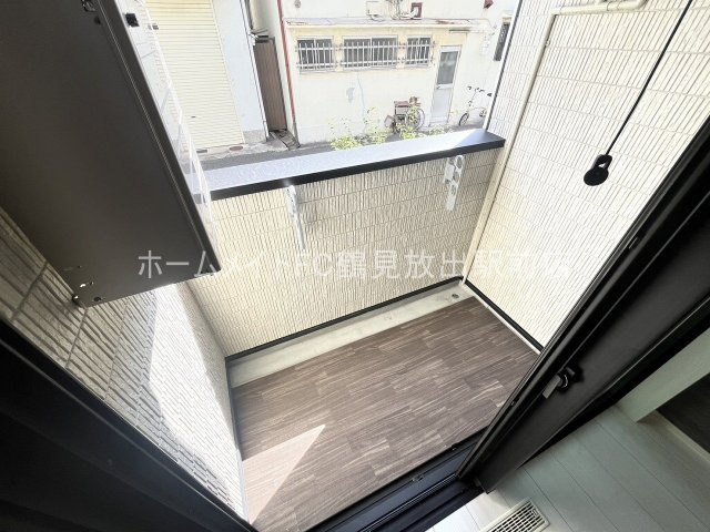 大阪市城東区鴫野東３丁目のアパートのバルコニー