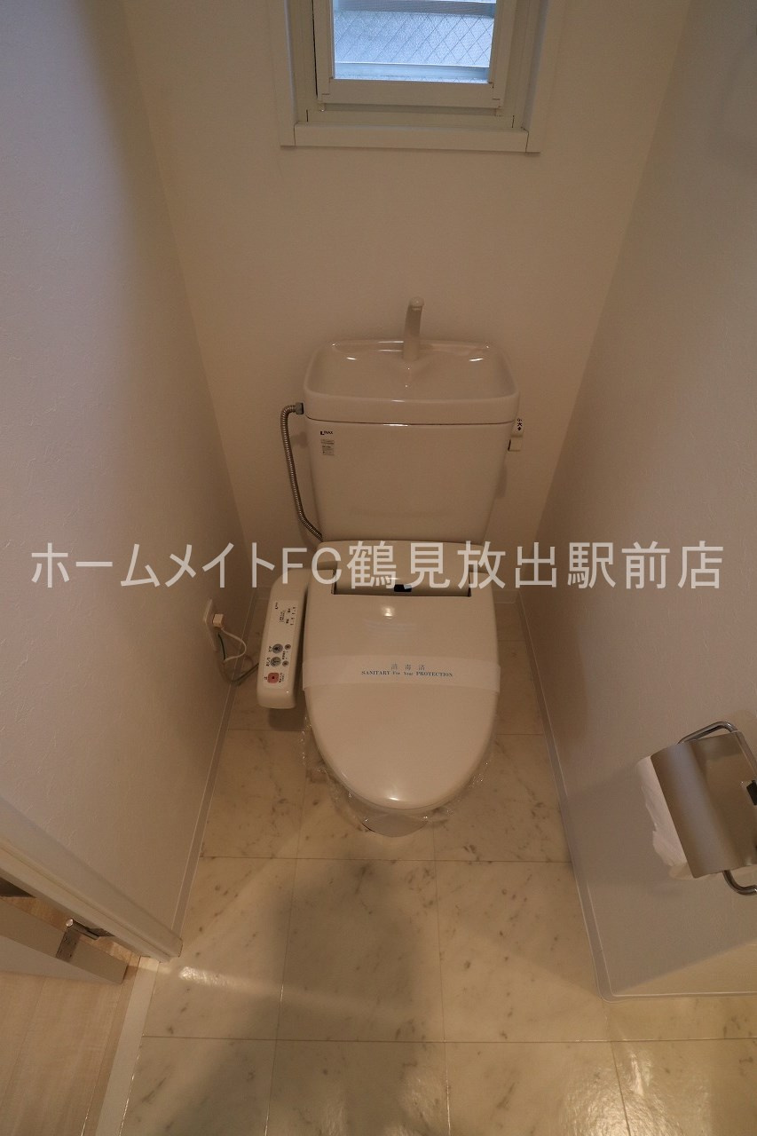 東大阪市森河内西２丁目の賃貸マンションのトイレ
