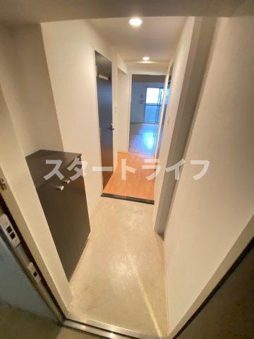 大阪市淀川区十三東１丁目の賃貸マンションの玄関