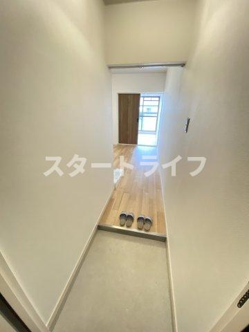 大阪市淀川区木川西１丁目の賃貸マンションの玄関