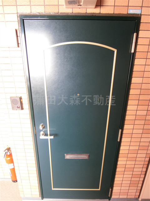 チェアーズ鵜の木の玄関