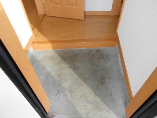 拓穂ハイツ (新開)の玄関