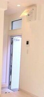 ラフィネ上中里の玄関