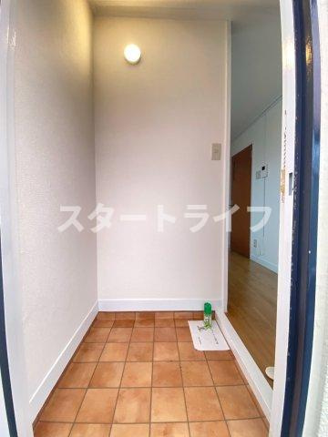 大阪市東淀川区菅原３丁目の賃貸マンションの玄関