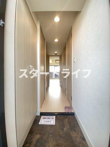 大阪市淀川区木川西２丁目の賃貸マンションの玄関